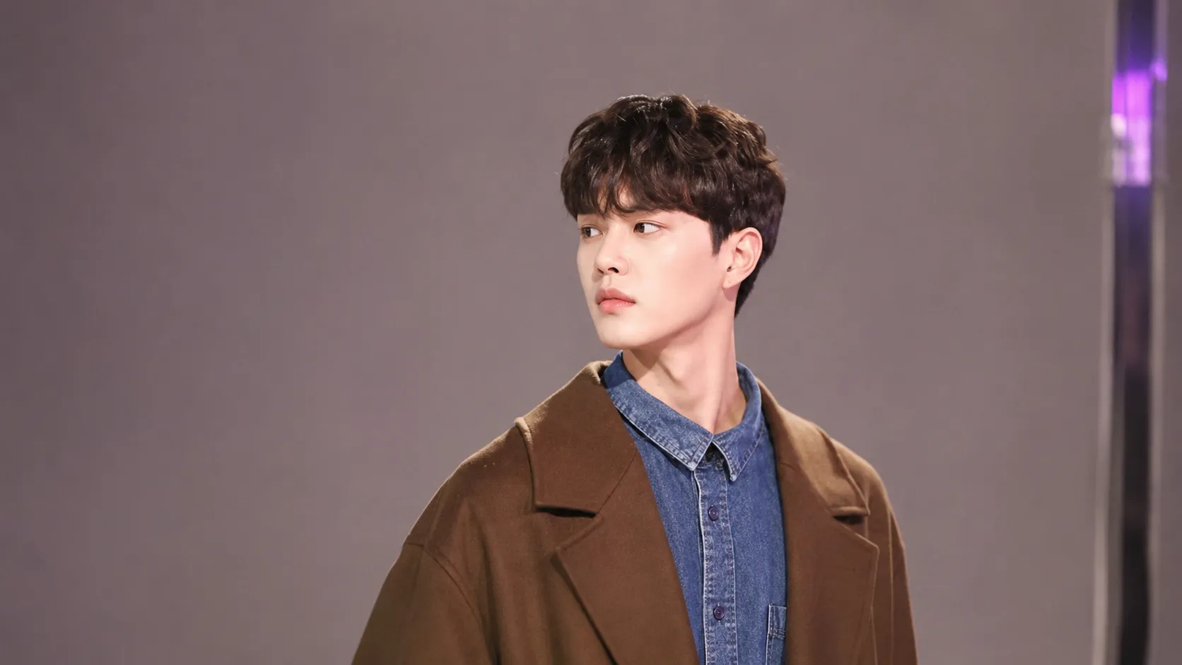 Korean fringe hairstyle featuring soft face-framing bangs and light layered volume