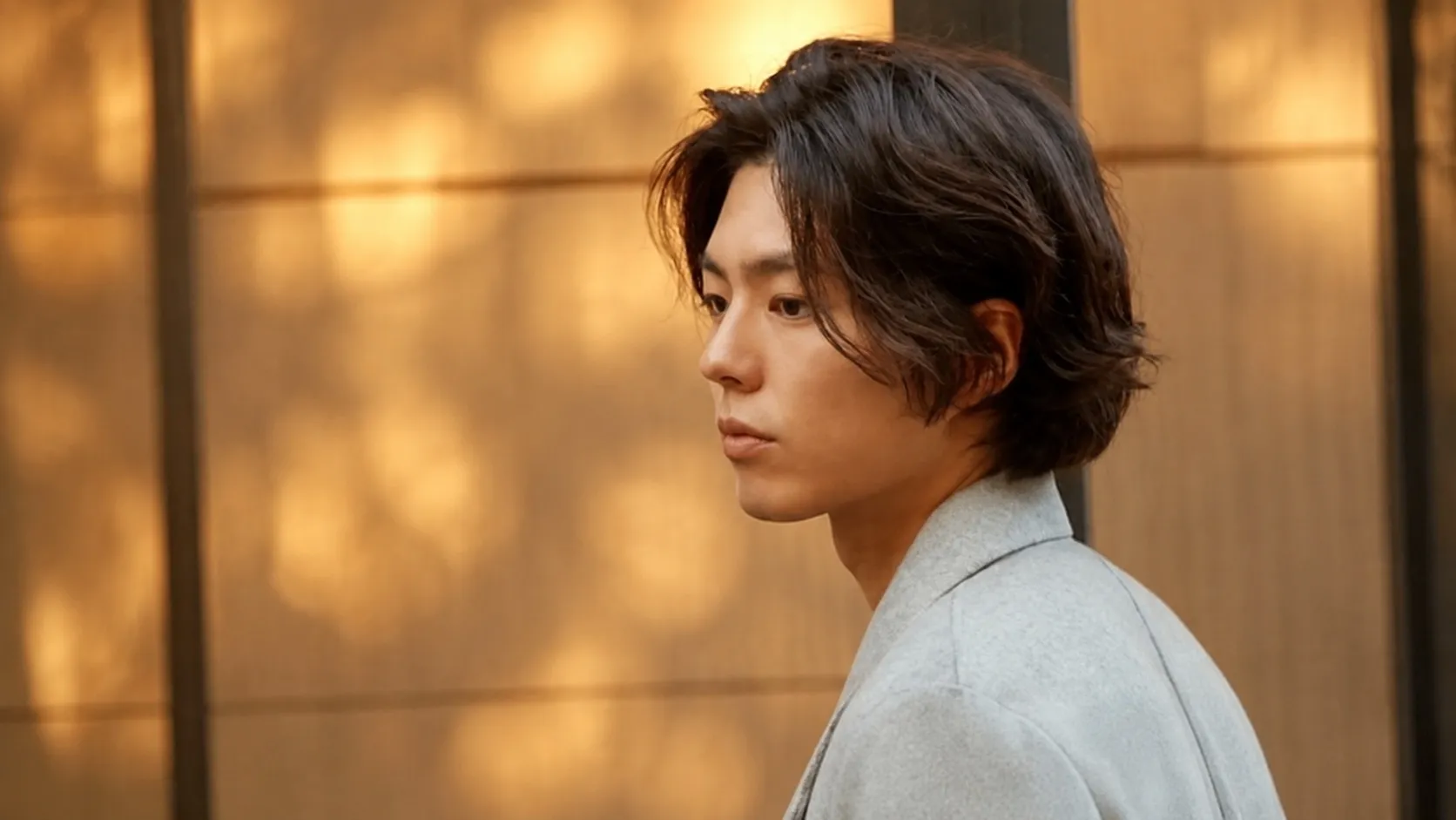 Layered Korean haircut displaying soft texturing, internal weight removal, and visible natural movement