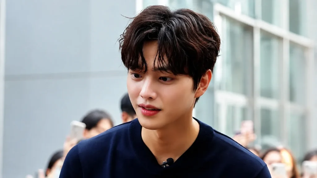 Soft Korean two-block haircut with a smooth natural side transition and textured top fringe for men